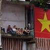 Photos show city balconies united under red flags for Vietnam's National Day
