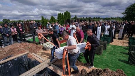 Funeral of 3 siblings killed in Russian strike underscores mounting toll on Ukrainian families