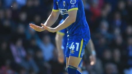 Ex-Chelsea defender Sam Hutchinson undergoes heart surgery after suffering health complications in League Two clash