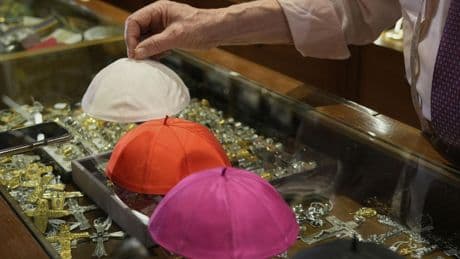 These papal tailors aren't expecting a traditional order for new cassocks to outfit the next pope