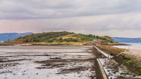 The deserted 'ghost island' full of WW2 ruins that is only accessible at low tide