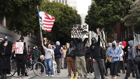 Protests over immigration raids pop up across the U.S. with more planned