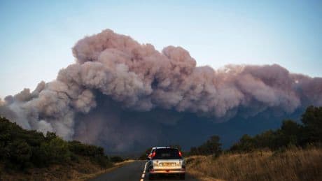 Tourists evacuated as France continues to battle biggest wildfire since 1949