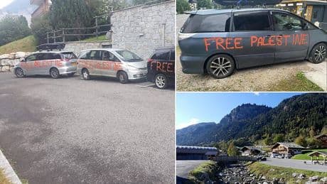 Cars belonging to Jewish tourists from Britain are covered in 'Free Palestine' graffiti in Alpine town