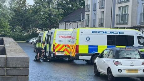 Police in 'riot gear' lockdown Scots street after early morning incident