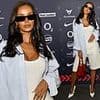 Maya Jama looks effortlessly cool in baggy white shorts and a busty vest as she attends KSI's Baller League event