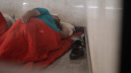Inside crime riddled homeless camps at Spain holiday airports where lifts are BEDROOMS & tourists dodge drugs & fleas