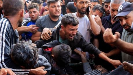 At least 50 Palestinians killed by Israeli army while waiting for Gaza aid trucks, rescuers say