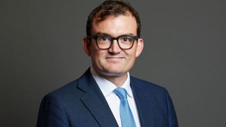 Tory MP charged with two sexual assaults at London’s Groucho Club
