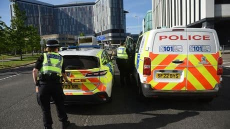 Cops pictured at scene of Glasgow crossbow incident after man stormed hospital