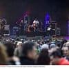 Music festival halted after band member 'collapses on stage' in front of horrified crowd
