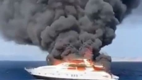 Watch as huge superyacht engulfed in flames off Ibiza coast