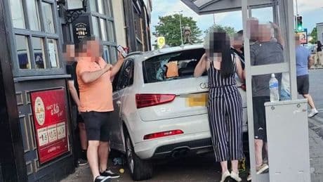 Car ploughs into pedestrian outside bar as police launch probe into 'hit and run'
