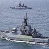 Royal Navy warship tracks Russian submarine and ships passing through English Channel as armed forces minister warns of Kremlin 'threat' to UK
