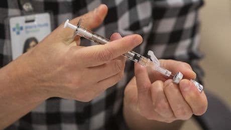 Alberta to begin charging residents a fee to get the COVID-19 vaccine