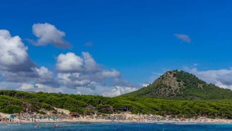 Brit tourist, 41, dies after plunging 16ft off wall in Majorca beach resort Cala Agulla after ‘losing his balance’