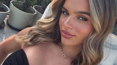 England star Morgan Gibbs-White’s girlfriend puts on busty display in revealing outfit for ‘date night’ on holiday
