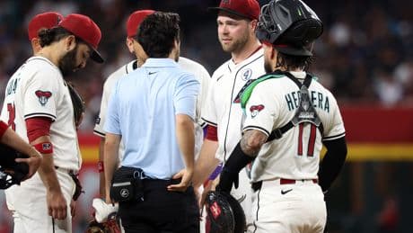 Corbin Burnes exits game with right elbow discomfort in major Diamondbacks injury scare