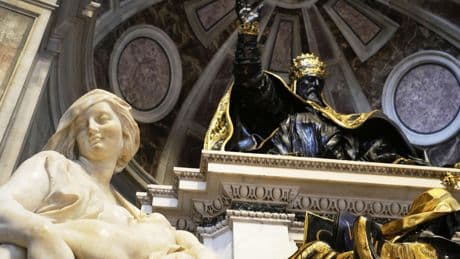 Pope makes another surprise appearance at St. Peter's, greeting restorers of papal tombs