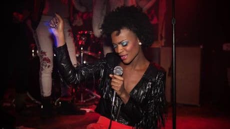 Woman singing in a bar gobsmacked after spotting A-list star standing behind her