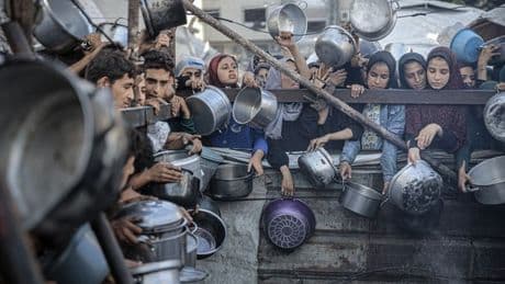 Gaza children seen emaciated and begging for food after baby starves to death
