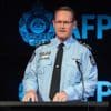Woman becomes third person charged under Australia's foreign interference laws