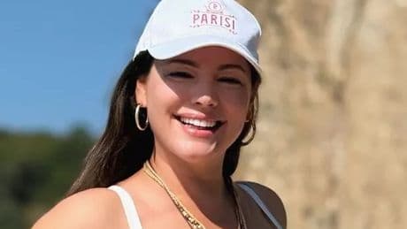 Kelly Brook, 45, branded 'a natural beauty' as she shows off curves in white bikini