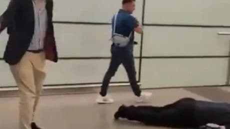 Tommy Robinson flees UK hours after he's seen next to unconscious man at St Pancras