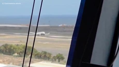 Dramatic moment Ryanair flight is forced to abort landing last minute just after touching down in Tenerife during storm