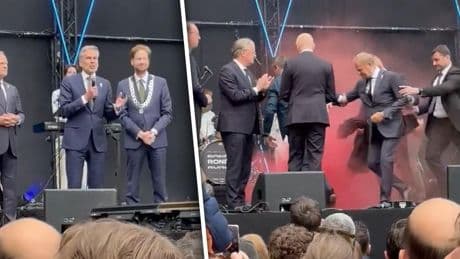 Beelden: rookbom op podium tijdens speech premier Schoof