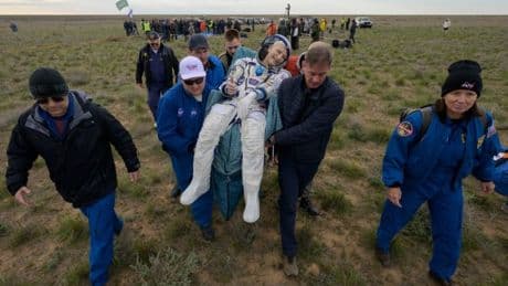 Oldest serving US astronaut parachutes back to Earth on his 70th birthday