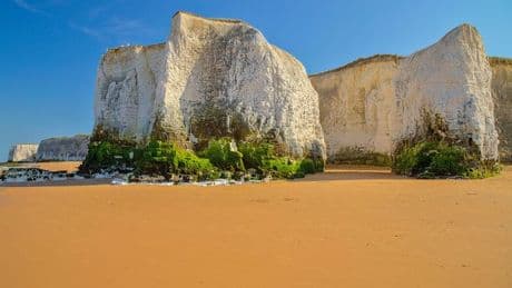 'Magical' UK beach with golden sands and hidden sea caves that appear at certain times
