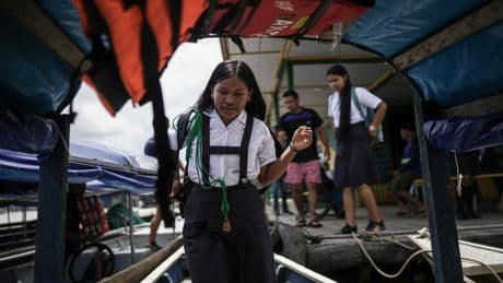 Daily life on a remote Amazon island goes on despite diplomatic dispute