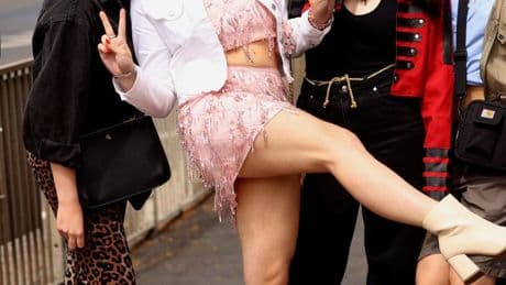 Boozy bank holiday revellers kick off three-day weekend by donning fancy dress for famous pub crawl