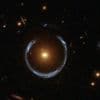 Sterrenkundigen ontdekken zwaarste zwarte gat ooit in ‘kosmisch hoefijzer’