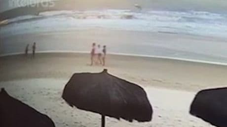 Three women filmed walking on Brazil beach - hours later they were found dead