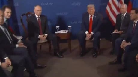 Chaotic scenes at Trump Putin summit as press clamor to ask questions of world leaders