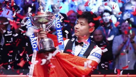 China's Zhao Xintong puts scandal behind him, becomes 1st snooker champ from Asia