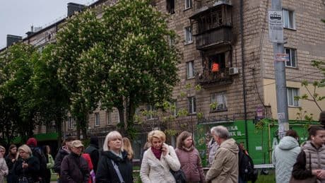 A Russian missile and drone attack kills 2 people in Ukraine's capital