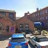 Council blasted for letting city centre hotel house migrants unlawfully and approving plans that add rooms for more