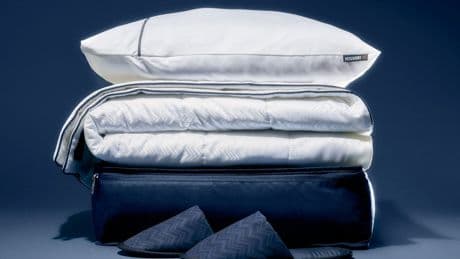 Delta unveils new designer amenity kits and bedding (complete with a cuddle pillow)
