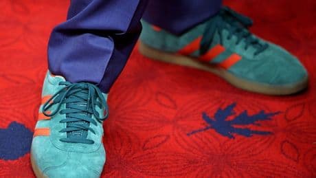 Justin Trudeau attends King Charles' throne speech wearing colourful shoes
