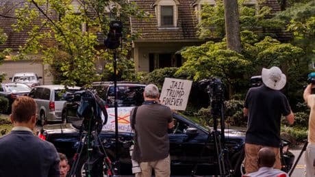 Search of Bolton’s Home Shows Uneasy Mix of Retribution and Law Enforcement