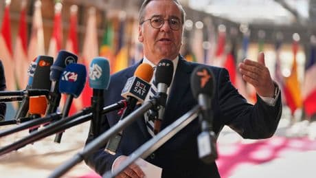 German defense minister says draft could return if volunteer numbers fall short