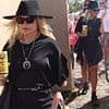 Holly Willoughby oozes festival chic in a leggy black mini dress and fedora as she leads the celebrities on the second day of sun-soaked Glastonbury
