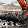 The end of Wet Wipe Island: Diggers clear 5MILLION wipes after 114-ton rubbish mountain piled up on banks of the Thames