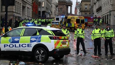 Man detained after car ploughs into Liverpool fans during club’s Premier League trophy parade