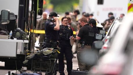 AP PHOTOS: 6 injured in a Colorado attack the FBI is investigating as terrorism