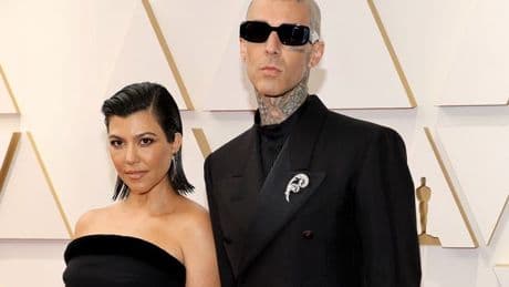 Kourtney Kardashian and Travis Barker booed by WWE crowd as she holds baby