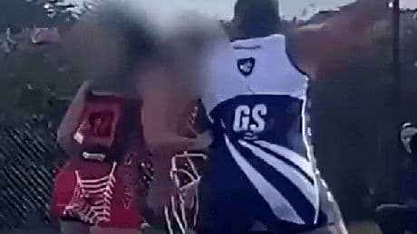 Moment trans netball player flattens opponent before being banned from league as rival teams threaten to boycott matches